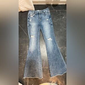 Distressed Blue Jeans